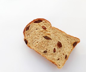 Closeup top view cinnamon raisin bread on white background.