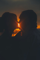 sunset couple silhouettes