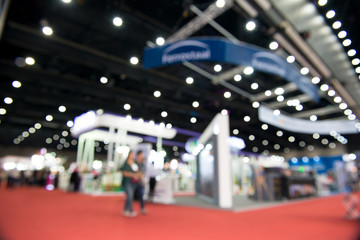 Blurred people in business center.