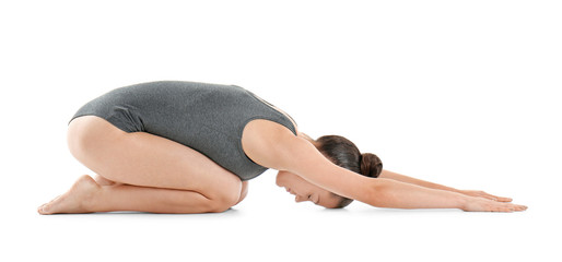 Young beautiful woman doing yoga pose on white background