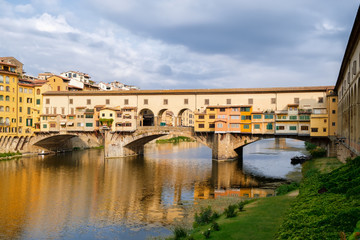 Fototapeta na wymiar The Ponte Vecchio, a medieval bridge over the river Arno in Florence, Italy
