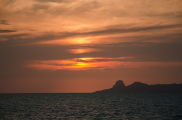 Naklejka na ściany i meble A beautiful sunset over the island. Thailand.