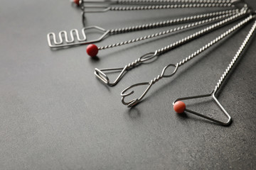 Set of logopedic probes for speech correction on grey background