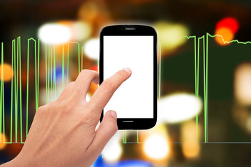 Hand touch smart phone with business chart screen and representing business growth with colorful bokeh  background.