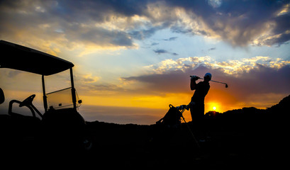 Golfer Silhouette at Sunset