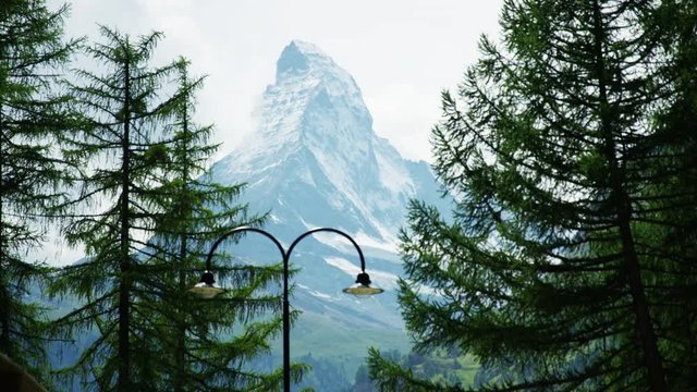 Matterhorn view with two trees in front - Shot on RED Digital Cinema Camera at 5K