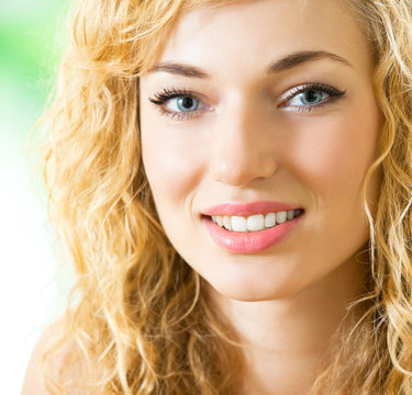 Smiling young beautiful woman, indoors