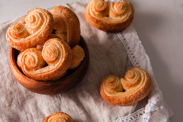 Fototapeta na wymiar Cookies Palmiers. Sweet puff pastry.