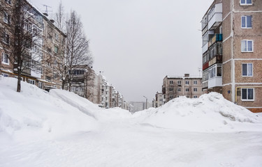 Russian winter. Huge snowdrifts in the courtyard