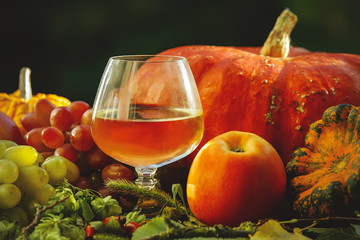 bright grapes and grape juice. pumpkin.
