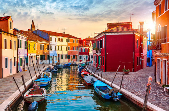 Burano island in Venice Italy picturesque sunset over canal