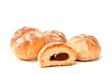 Gingerbread with jam on white