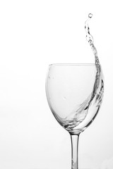 a glass of water on a white background