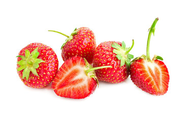 three berries of ripe juicy strawberries on white table