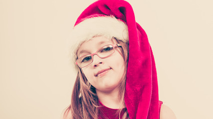 Christmas girl in santa hat festive outfit