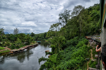 Fototapeta na wymiar Train ride among River Kwai