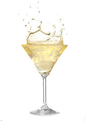 Glass of lemon drop martini with splash on white background