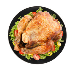 Plate with roasted turkey on white background