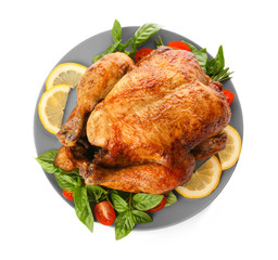 Plate with roasted turkey on white background