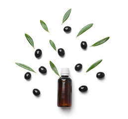 Composition with olive oil on white background
