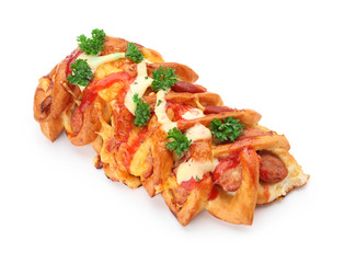 Tasty pastry with sausage on white background