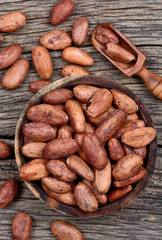 Cacao beans in a bowl on table