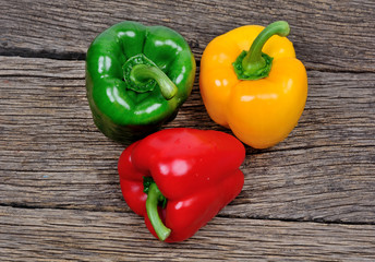 Colorful pepper on wooden background