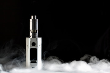 Electronic cigarette over a dark background.