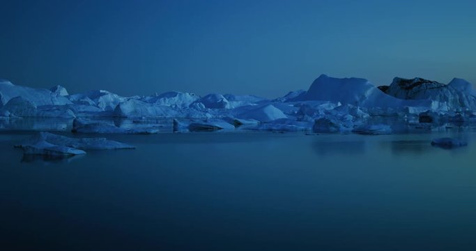 Icebergs floating in Disko bay in Greenland