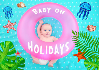 Cute baby with pink swim ring lying on bedspread. Holidays at sea with baby, concept