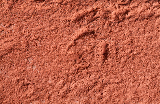 Fragment of a wall made of red fire-brick