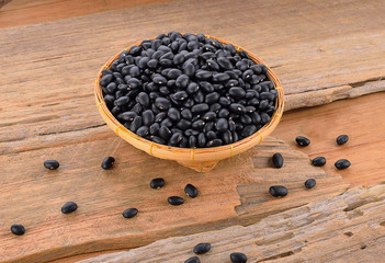 Black bean on wooden floor