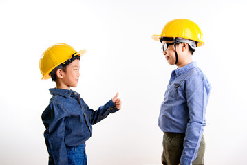 Engineering Thai Asian boy in yellow helmet