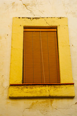 window shutters on an old european style building, architectural decoration old windows, vintage style, a protective element of windows