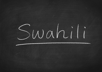 Swahili word on a blackboard background