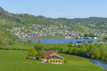 Splendid summer view with popular waterfall Steinsdalsfossen on the Fosselva River