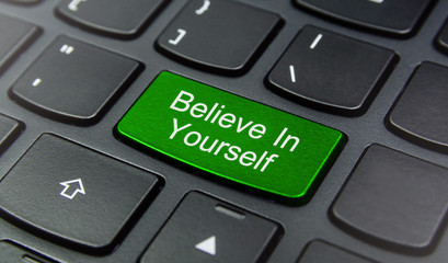 Close-up the Believe In Yourself button on the keyboard and have Green color button isolate black...