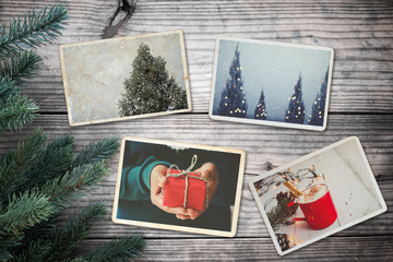 Photo album in remembrance and nostalgia in Christmas (winter season) on wood table. photo of retro...