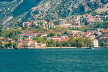 Fototapeta na wymiar Fragment of a beautiful small town in Kotor Bay, Montenegro.