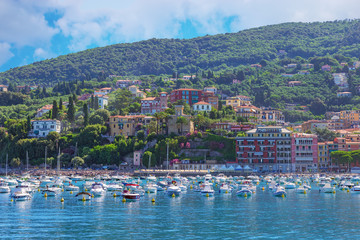 Fototapeta premium Beautiful view from the sea on beach of Lerici, Ligurian coast of Italy in province of La Spezia.