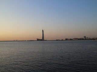 Naklejka premium high-rise building on the shore