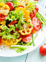 Red-yellow tomatoes salad