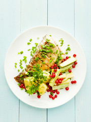 Baked carpenter with herbs