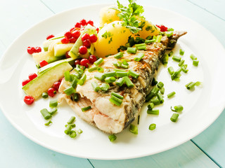 Baked carpenter with herbs