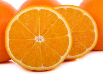 Orange fruit with half isolated on white background.