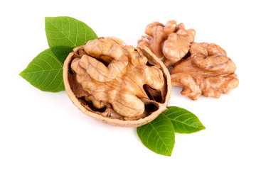 Walnut with leaf isolated on white background