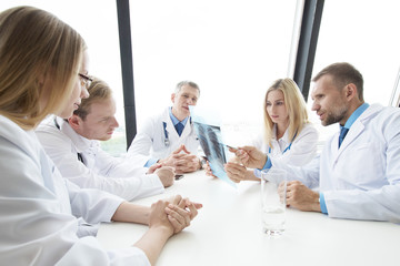 Fototapeta premium Group of medics with x-ray scan