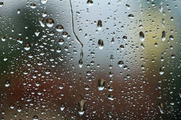 Rain drops on window glass , rainy day