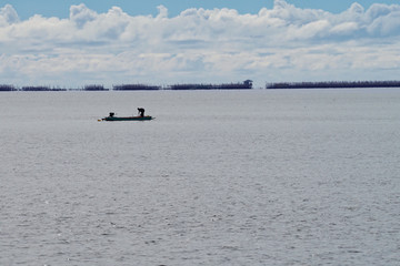 Obraz premium The sea, the sky, and the river are the ways of fishermen.