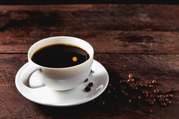 White coffee cup and beans
